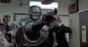 RoboCop-demonstrating-his-skills-with-the-Auto-9-at-the-range-2470185506