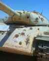 Egyptian IS-3 used as a target by the Israelis, I think the writing says AP 105 mm..jpg