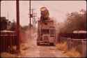 lossy-page1-1280px-MECHANICAL__ARM__OF_GARBAGE_TRUCK_PICKS_UP_320-GALLON_TRASH_CONTAINER_AND_DUMPS_CONTENTS_INTO_TRUCK._NICKNAMED..._-_NARA_-_544057.tif