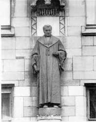 A statue at Stuttgart City Hall by Daniel Stocker (d. 1957) after a model created by Georg Rheineck (1846-1916). This statue stood unscathed amidst the rubble of Stuttgart city center following a devastating WWII bombing raid.