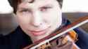 acid attack victim learns violin