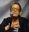 Lou Reed is gesturing at himself