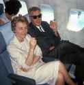 couple-smoking-on-an-airplane-1960s-v0-g3u5x017xui81