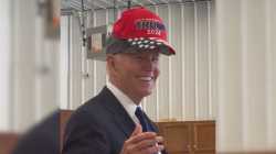 75193819007-trnd-biden-puts-on-trump-hat-thumb