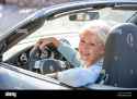 senior-woman-in-her-sports-car-2A85NBK