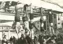 Mussolini_e_Petacci_a_Piazzale_Loreto,_1945