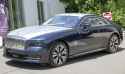 2024_Rolls-Royce_Spectre_in_Midnight_Sapphire_over_Silver,_front_left