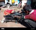district-katni-india-december-14-2019-an-indian-village-mechanic-repairing-truck-engine-at-open-automobile-workshop-field-2CPBG5G