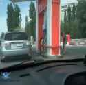 Woman at gas station.webm