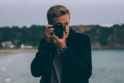 male-photographer-in-action-