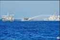 Philippine resupply boat, as it get bombarded and beset by China Coast Guard watercannons