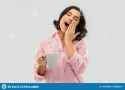 happy-yawning-young-woman-pajama-coffee-people-bedtime-concept-happy-sleepy-young-woman-pajama-mug-coffee-144279595