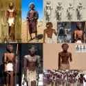 Beja man In the desert with an afro, a stick, and skirt~