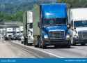 semi-trucks-pack-crowded-interstate-highway(1).jpg