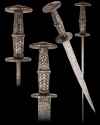 Rondel dagger with ornate silver handle