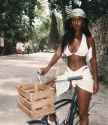 black-woman-in-bikini-white-bicycle-q8wvagm8saw4ocpc