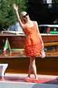 anya-taylor-joy-looks-cute-in-an-orange-dress-while-arriving-at-the-78th-venice-international-film-festival-in-venice-italy-050921_5