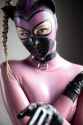 girl-in-pink-transparent-latex-catsuit-16.large