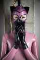 girl-in-pink-transparent-latex-catsuit-17.large