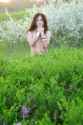 beautiful-girl-flowered-garden-topless-nude-covered-lush-36390625