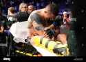 london-uk-july-23-tom-aspinall-leaves-the-octagon-on-a-stretcher-after-suffer-a-serious-knee-injury-during...v-aspinall-event-at-the-o2-arena-on-july-23-2022-in-greenwich-london-united-kingdom-photo-by-scott-garfittpximages-2JJ7903