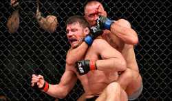 Georges-St-Pierre-chokes-Michael-Bisping-875623