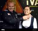 stuart-bingham-of-england-interacts-with-ng-on-yee-of-hong-kong-during-a-friendly-snooker-match-in-hong-kong-china-25-june-2015-W8D29G