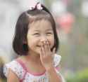 Chinese-kid-laughing-300x281