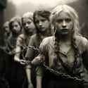 beautiful-girls-hostages-captives-slaves-shackles-chains-work-as-slaves-abuse-terror_888396-19889