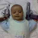 baby with guns