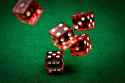 Rolling-dice-GettyImages-93453966-58a6f50c3df78c345b634f6f-468197338