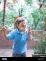 boy-pressing-face-against-glass-D5557E