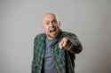 angry man pointing at screen