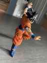 more-df-goku-posing-v0-k2s1neh07zfd1