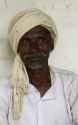 Farmer_adivasi_with_turban,_Umaria_district,_M.P.,_India_-_cropped