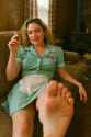 20250510_2307_Retro Waitress on Couch_simple_compose_01jtymxqgffc2bjdyg5na103ew