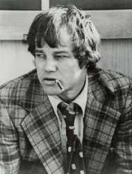 Joe_Don_Baker__Mitchell__(1977_CBS_press_photo)