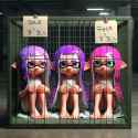 Three Splatoon inkling girls confined in a 3&#039; x 3&#039; cubic enclosure, very sad crying expression, barefoot, damp hair, bath towel wrap, sale tag on frame, industrial steel, abandoned warehouse background, HD 3D_3d34dcdb-c6d4-4b31-bc42-1f9e3f55b9c1