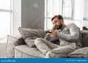 portrait-bored-young-man-holding