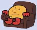 pac-man sitting in a couch sad