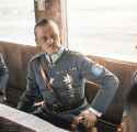 1060px-Marshal_of_Finland_Carl_Gustaf_Emil_Mannerheim_having_a_cigar_in_a_train_during_his_visit_in_Germany,_1942._(49960472022)
