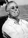 pres-franklin-roosevelt-smokes-cigarette-and-fishing-during-vacation-on-gulf-of-mexico-may-10-1937_u-l-ph7vvt0