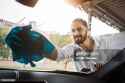 young-man-washing-windshield_jpg