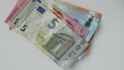 stock-video-hand-european-man-counting-euro-bank-notes-euro-coins-white (1)