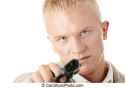 young-man-aiming-with-pistol-in-hand-young-caucasian-blond-man-aiming-with-pistol-in-hand-stock-photos_csp2936053