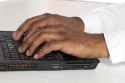 brown-hands-typing