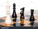 stock-photo--check-mate-in-the-game-of-chess-when-the-king-is-defeated-as-the-other-side-has-the-next-move-195234977