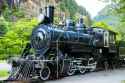 steam-engine-train-locomotive-old-sits-sits-tracks-mountains-32058075