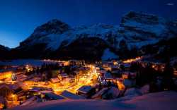 night-lights-in-the-snowy-mountain-town-54153-1920x1200
