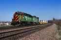 gp50_in_tigerstripe_hauling_the_burlington_northern_no__3_through_naperville__illinois__usa